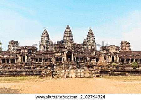 Angkor wat complex of temples in Cambodia siem reap. travel Concept. buddhist temple in the jungle forest. popular tourist destination in Asia. stone murals and sculptures of ankor tom. Khmer pagoda
