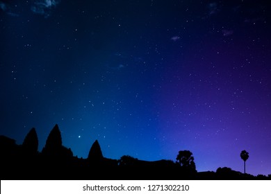 Angkor Wat Temple Silhouette At Blue Starry Night 