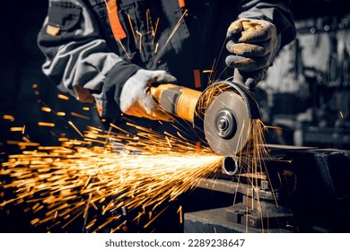 Angle grinder at work, sparks and dust from the cut-off stone. - Powered by Shutterstock