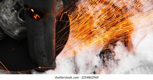 An angle grinder works, sparks stream close up photo - Shutterstock ID 2254842969