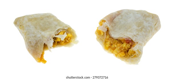 An Angle View Of A Breakfast Burrito Split In Half On A White Background.