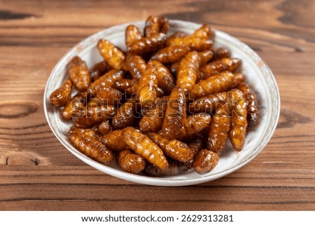angle view edible silkworm pupae at horizontal composition