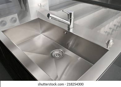 Angle View Of Kitchen Sink With Silver Faucet
