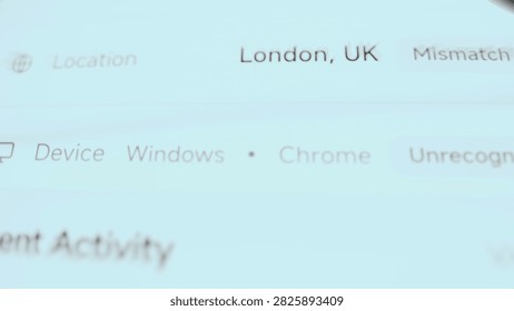 Angled close-up of a mobile banking security screen where an unrecognized desktop browser session with a location mismatch.