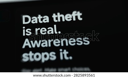 Angled close-up of a mobile cybersecurity screen where data theft awareness message promotes safer decisions.