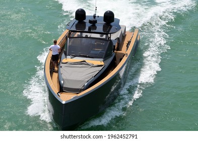 

Angled Overhead View Of A High-end Luxury Motorboat.