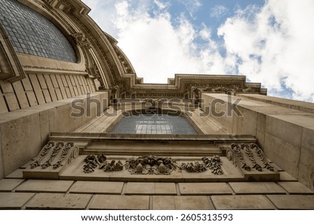 An angled perspective of St. Paul s Cathedral highlights its sculpted facade and elegant curved stonework.