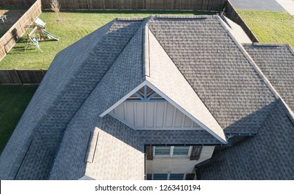 Angled shot of ventless shingle construction with gables