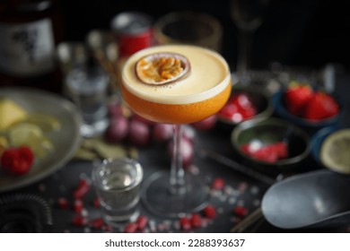 Angled Side View of Exotic Pornstar Martini with Passion Fruit Slice - A Delicious and Tropical Cocktail with a Tangy Twist