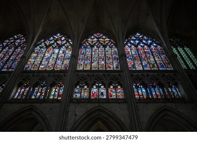 Angled view of Gothic clerestory stained glass windows inside Troyes Cathedral, Troyes, Aube, Grand Est, France.
