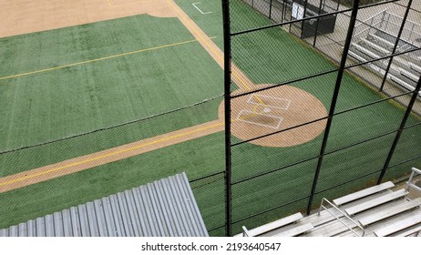 Angled View Of A Large, Empty Baseball Field On An Overcast Day