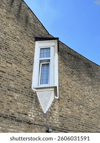 Angled window on a wall open
