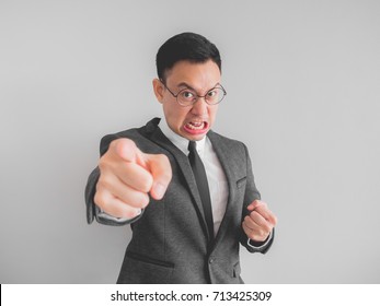 Angry Asian Boss Manager Businessman In Black Suite.