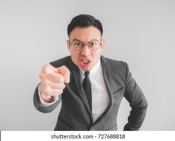 Angry Asian Boss Manager Businessman In Black Suite.