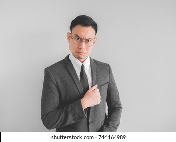 Angry Asian Boss Manager Businessman In Black Suite.