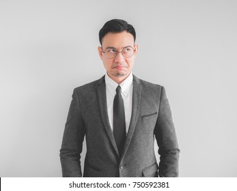 Angry Asian Boss Manager Businessman In Black Suite.