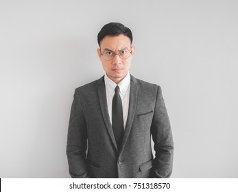 Angry Asian Boss Manager Businessman In Black Suite.