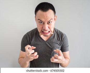 Angry Asian Man Portrait With Funny Mad Face.