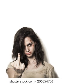 Angry Beaten Up Girl With Wounds On The Face Showing Middle Finger