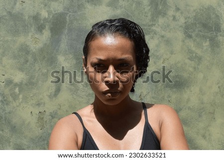 Similar – Portrait of a woman in a lake