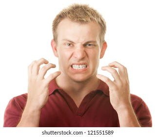 Angry blond muscular Caucasian man with clenched teeth