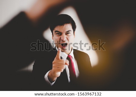 Angry Boss get frustrated, yelling, reprimanding to employee, worker that worker mistake important deadline or work, bossy boss pointing finger to employee. Working person get fired. Irritated manager Stock photo © 