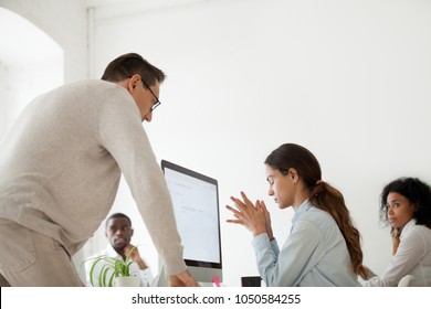 Angry Boss Scolding Criticizing Firing Stressed Intern For Incompetence In Multiracial Office, Sad Frustrated Employee Receives Unfair Reprimand Rebuke, Suffers From Bad Attitude Of Executive At Work