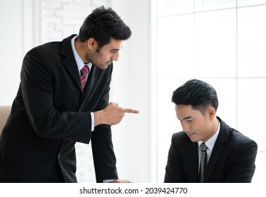 Angry Boss Standing Opposite Scolding At Employee For Missing Deadline, Executive Manager Scolding Ineffective Salesman Showing Bad Work Results, Team Leader Dissatisfied With Report In Office.