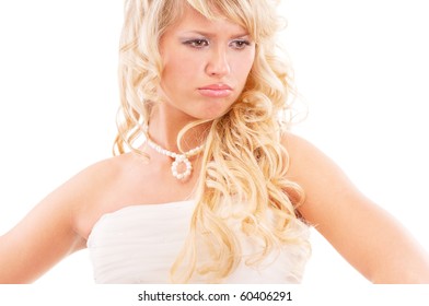Angry bride in expectation of groom, isolated on white background.