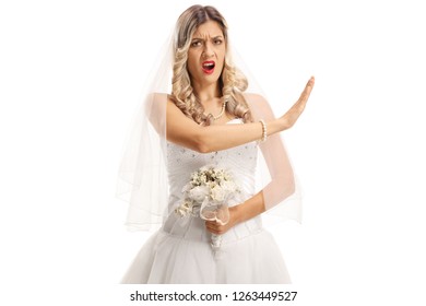 Angry bride gesturing stop with her hand isolated on white background