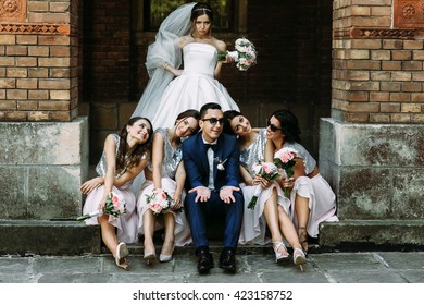 Angry bride and groom with the bridesmaids