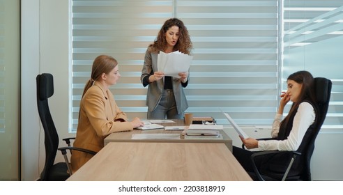 Angry Buisness Woman Boss Shouting At Her Employees During Meeting Conference Leaving The Room. Annoyed Employer Demand A Result. Bad Work Bullying. Team Work Trouble.