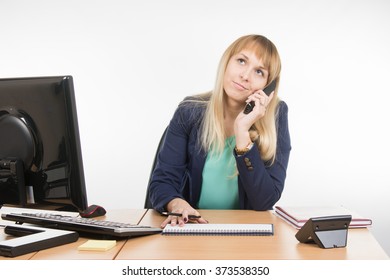 Angry Business Woman Talking On The Phone And Looking Up