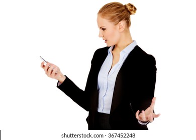 Angry Business Woman Yelling To The Mobile Phone