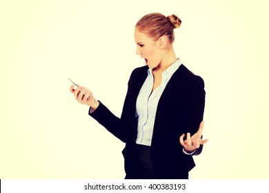 Angry Business Woman Yelling To The Mobile Phone