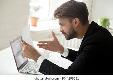 Angry Businessman Indignant Disagree With Information In Mail Business Letter, Annoyed Disgruntled Entrepreneur Frustrated Stressed By High Taxes Bill Or Past Due Unpaid Debt, Bad Financial Results