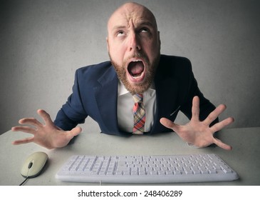 Angry Businessman Typing 