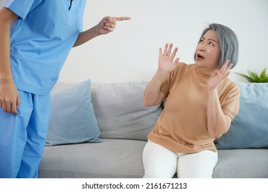 Angry Caregiver Blaming Or Mistreating Senior Woman When She Mistake Something