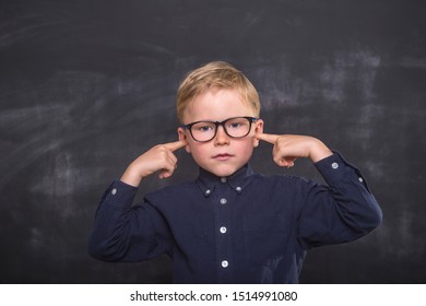 Angry Child Close Ears With Hands. Stop Listening Parents And Teacher  Isolated On Colored Background. Child Boy Screaming And Crazy Expression.