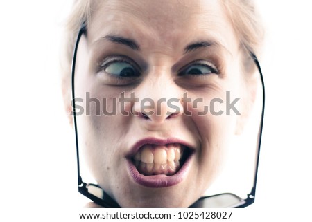 angry cross-eyed young woman freaking out Stock photo © 