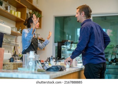 Angry Customer Complaining About Barista In Coffee Shop