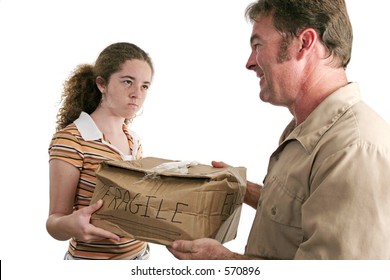 An Angry Customer Receiving A Smashed Package From A Delivery Man (focus On Girl)