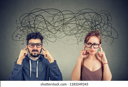 Angry displeased couple woman and man ignoring not listening each other exchanging with many negative thoughts