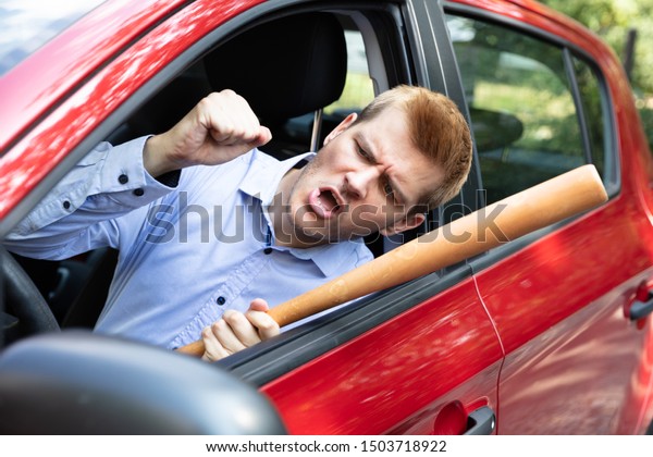Angry Driver With Baseball Bat Screaming Out Of\
Car Window