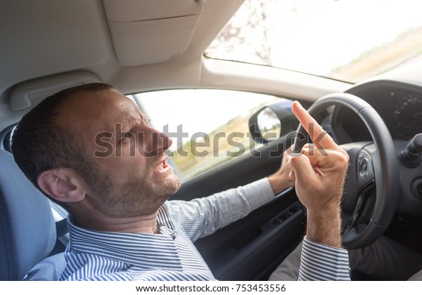 Angry driver\
gesturing bad, road rage\
theme