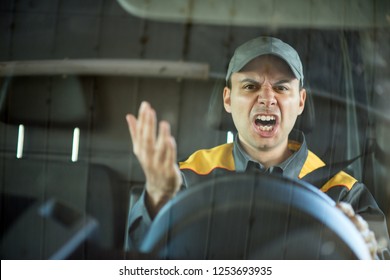 Angry driver shouting in his vehicle