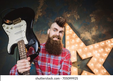 Angry Excited Punk Rocker Man With Electric Guitar