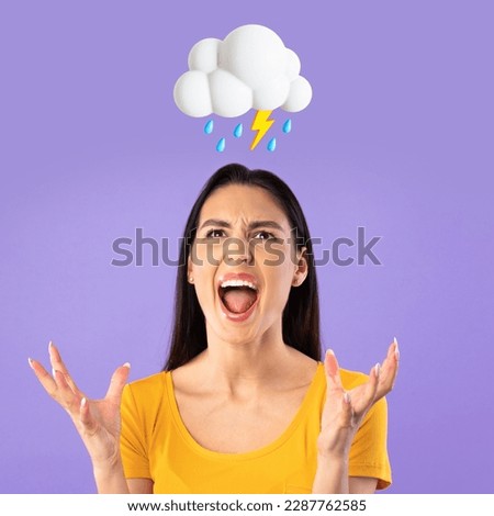 Angry excited young caucasian lady freaking out, scream from stress with open mouth with abstract cloud of lightning and rain sign above head on violet studio background. Pms, negative emotion