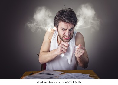 Angry Frustrated Man Tearing Apart Is Bills, Smoke Coming Out Of His Head