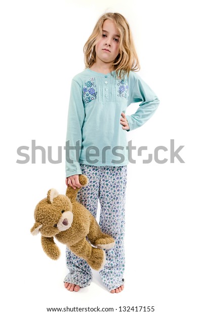 teddy bear wearing pajamas